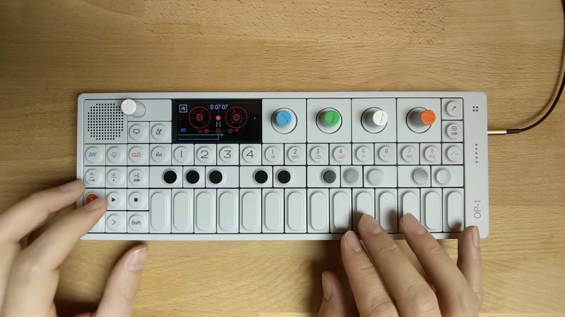 Screenshot from a video of real-time song creation on a Teenage Engineering OP-1 synth